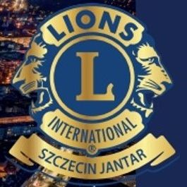 logo Lions International Szczecin Jantar. Granatowo złoty z lwem