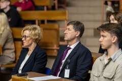 uczestnicy wykładu siedzący w auli wykładowej